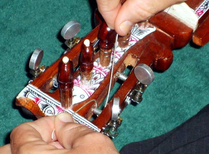 Mounting a dilruba string (permanent step 1)